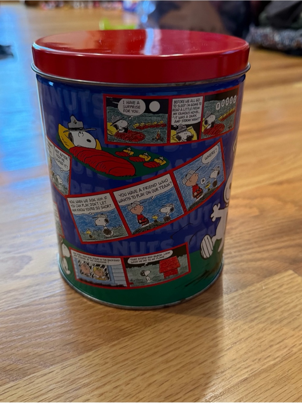 Vintage tin Peanuts comic strips contains a 12” x 34” jigsaw puzzle 700 pieces.